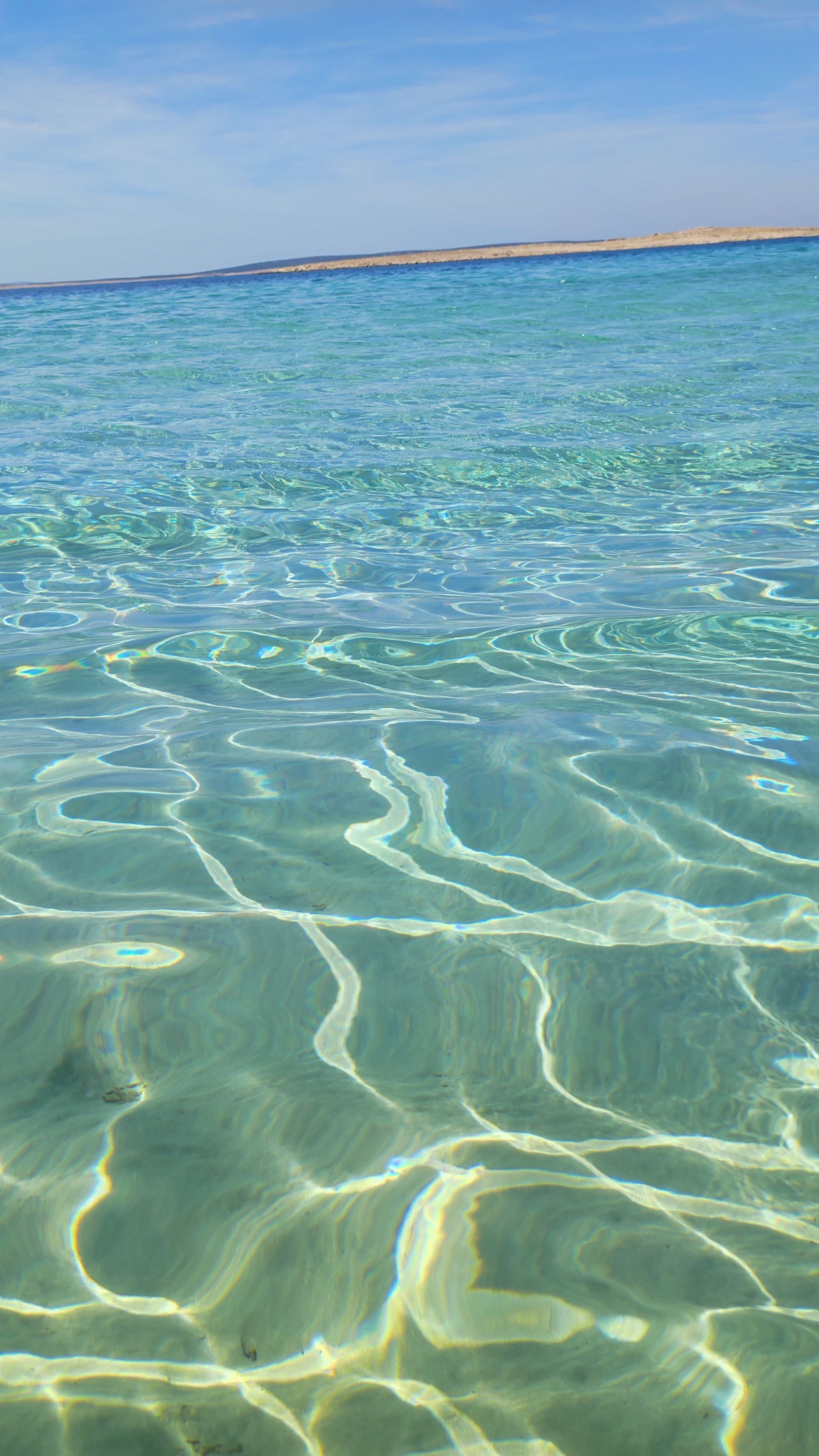 Foto di Dunboka Draga con una superficie del acqua cristallina