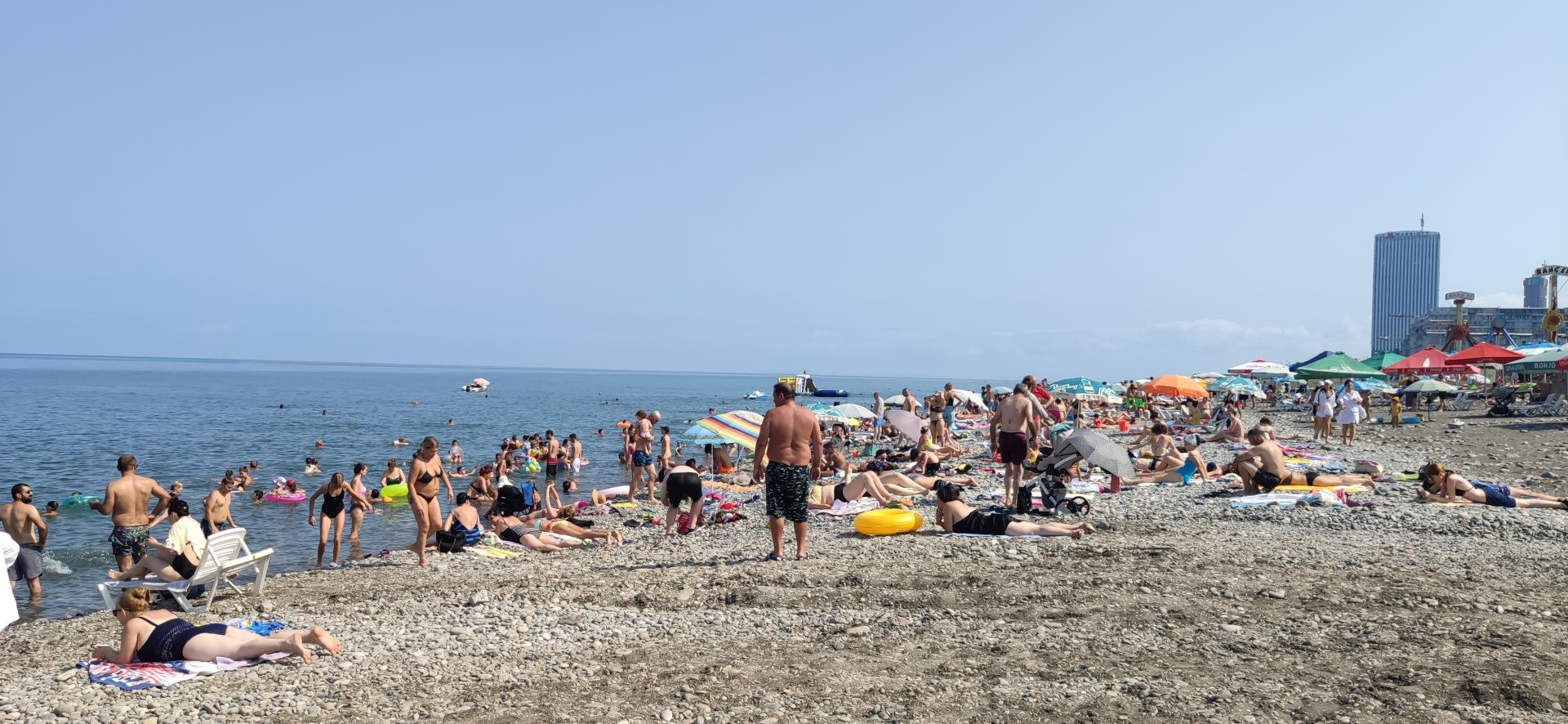 Photo of Batumi beach with turquoise water surface
