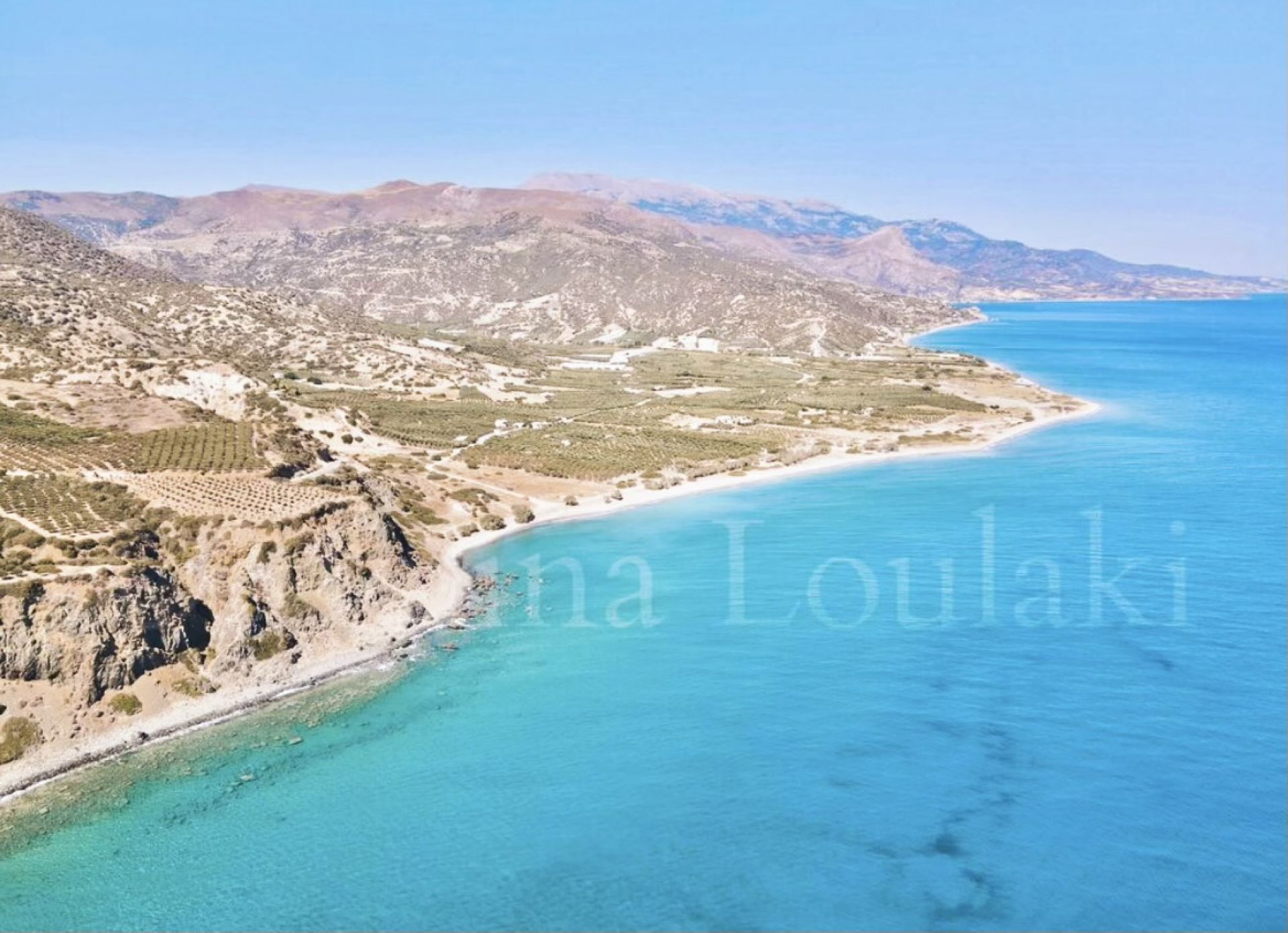Foto af Dermatos beach med høj niveau af renlighed