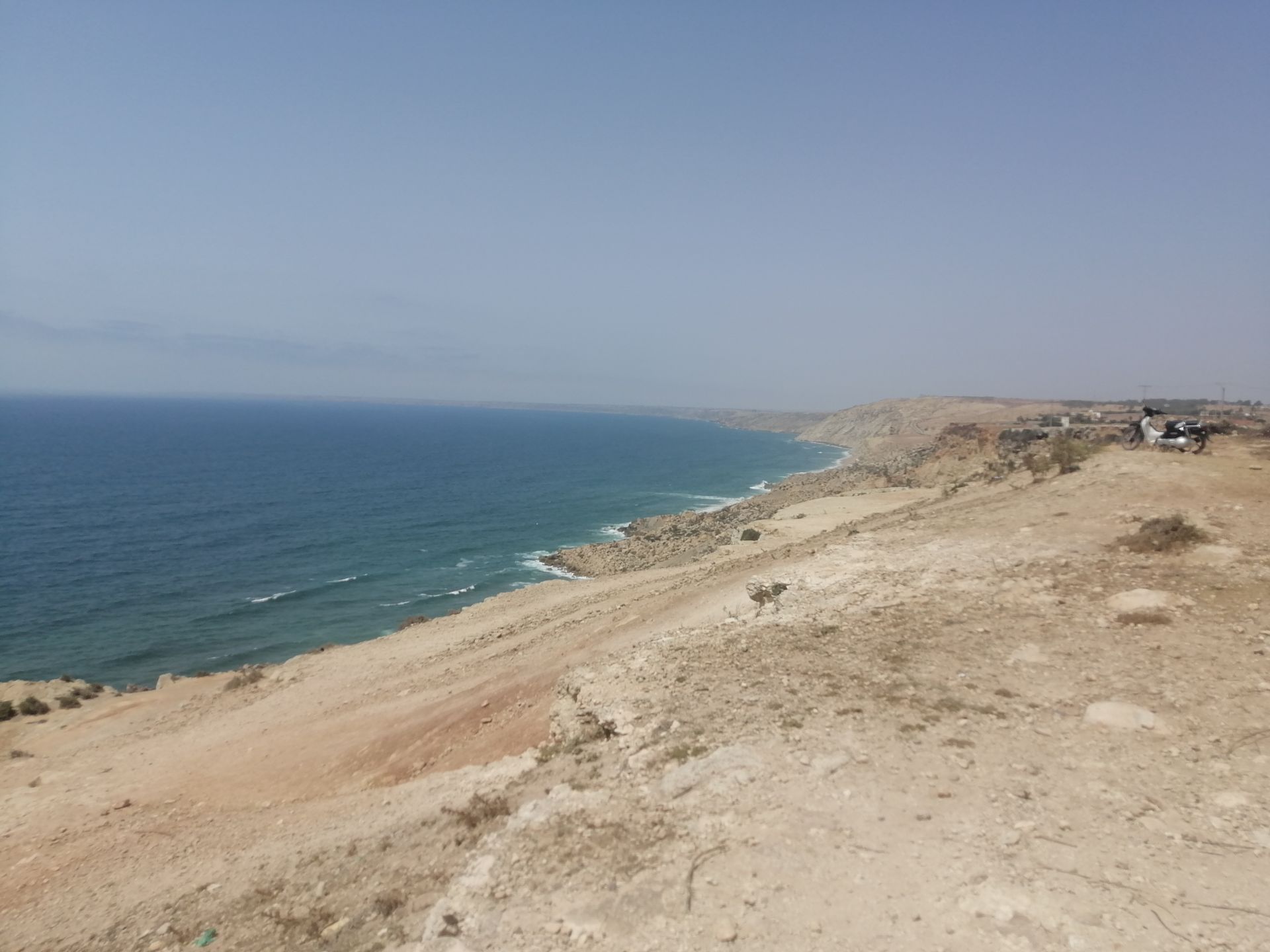 Photo of Sidi Boudala backed by cliffs