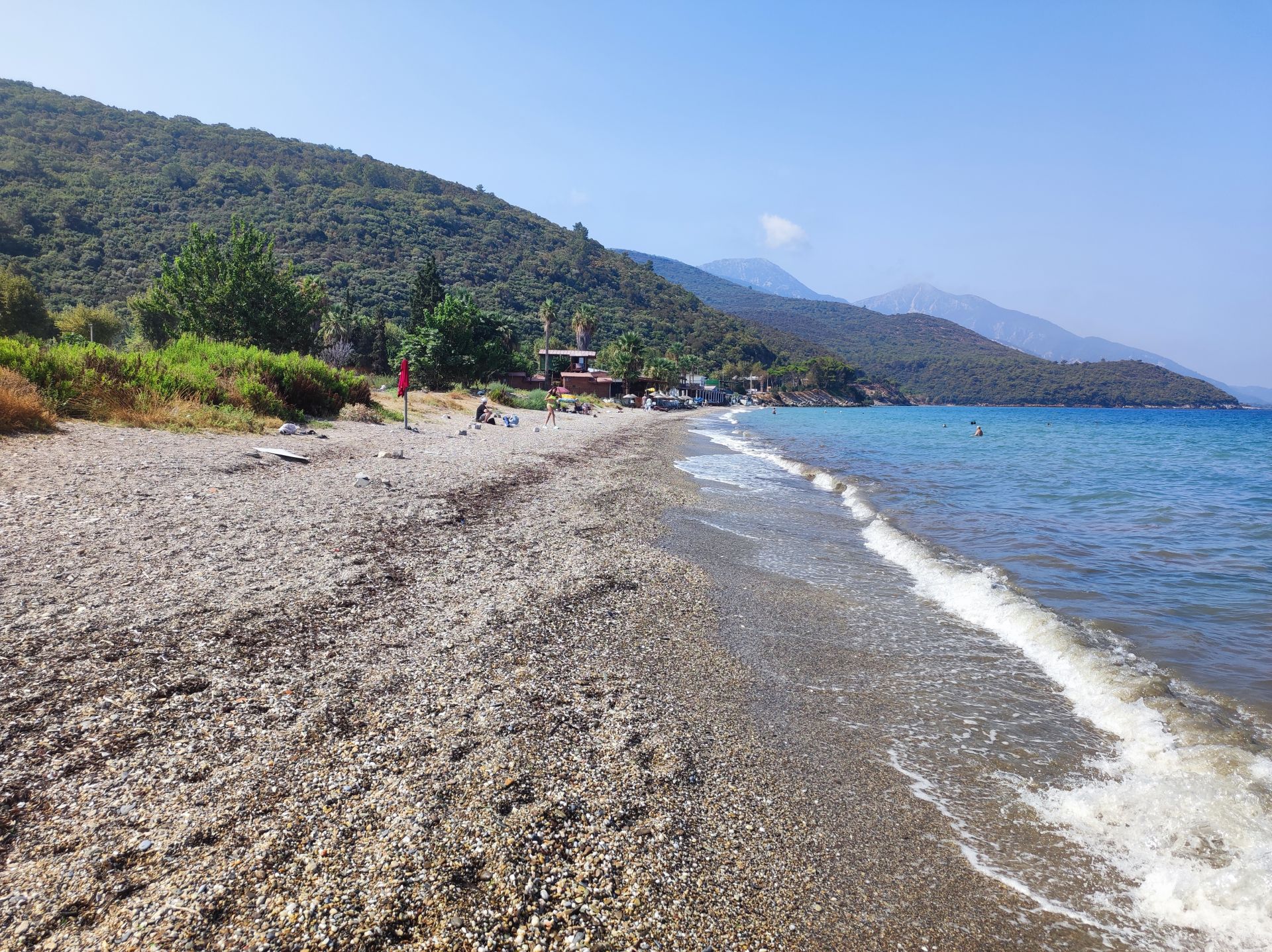 Fotografie cu Guzelcamli beach - locul popular printre cunoscătorii de relaxare
