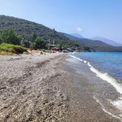 Fotografie cu Guzelcamli beach - locul popular printre cunoscătorii de relaxare